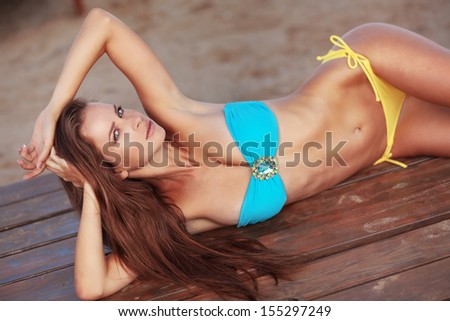 Portrait of sexy fashion model wearing bikini beach series
