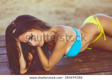 Portrait of sexy fashion model wearing bikini beach series