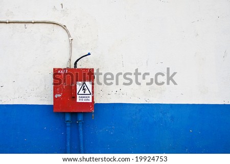 Electrical box on textured wall