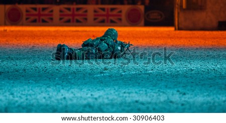 WINDSOR - MAY 16: Royal Marine Commandos in combat exercise at the Windsor Royal Tattoo on May 16, 2009 in Windsor, UK.