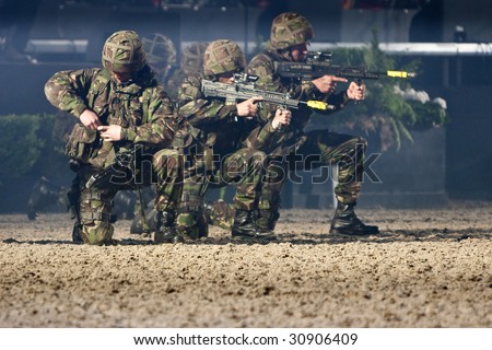 stock photo : WINDSOR - MAY 16: Royal Marine Commandos in combat exercise at 
