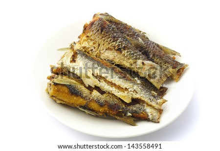 Fried fish sticks isolated on white