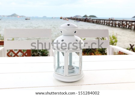 lantern on white table  background