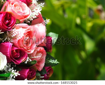 Red roses bouquet with free space for text