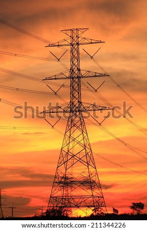Impression network at transformer station in sunrise, high voltage up to full color sky take with sunset tone