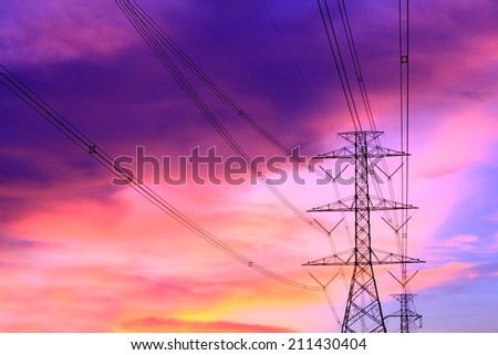 Impression network at transformer station in sunrise, high voltage up to full color sky take with sunset tone, horizontal frame