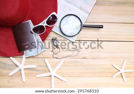 travel concept,  Preparation for travel,  money, passport, road map on wooden table