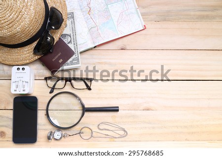 travel concept,  Preparation for travel,  money, passport, road map on wooden table