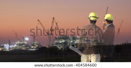 Double exposure man survey or civil engineer stand on ground working over Silhouette Building construction site. examination, inspection, survey