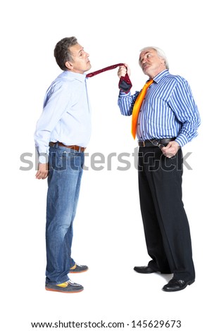businessman pulling a tie to younger man on white background