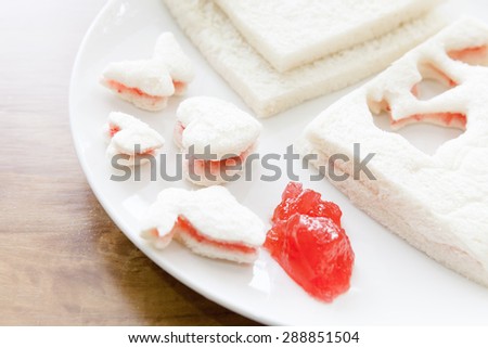 Bread press in cute shape with strawberry jam