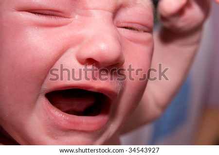 baby crying portrait. sad