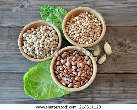 three different types of vegetables in wooden bowl