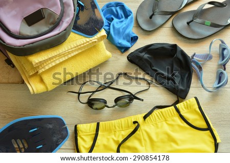 accessories for swimming pool (swimming goggles, hat, bathing suit, bag, etc)