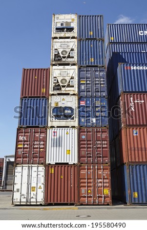 HAMBURG, GERMANY - MAY, 17. A pile of containers (FEU) and refrigerated containers at the Port of Hamburg taken at bright sunlight on May 17, 2014.