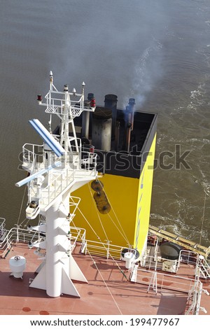 BELDORF, GERMANY - JUNE, 8. Exhaust fumes of a vessel at the Kiel Canal near Beldorf (Schleswig-Holstein, Germany) on June 8, 2014.