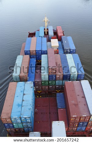 BELDORF, GERMANY - JUNE, 15. The container vessel Wybelsum at the Kiel Canal near Beldorf (Germany, Schleswig-Holstein) taken on June 15, 2014.
