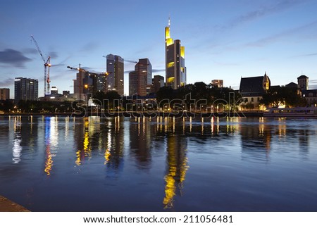 FRANKFURT, GERMANY - JUNE 13. Towers of the biggest bank companies at Frankfurt / Main (Germany) taken in the evening (blue hour) on June 13, 2014.