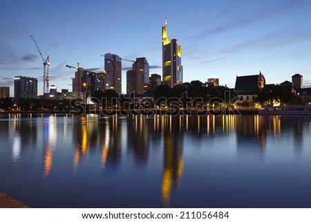 FRANKFURT, GERMANY - JUNE 13. Towers of the biggest bank companies at Frankfurt / Main (Germany) taken in the evening (blue hour) on June 13, 2014.