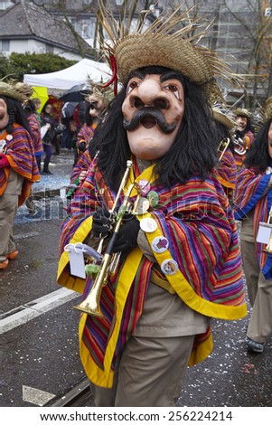 BASEL, SWITZERLAND - FEBRUARY, 23. The Carnival at Basel (Basle - Switzerland) in the year 2015. The picture shows some costumed people on February 23, 2015.