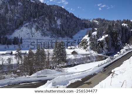 An U-turn of a switchback (road) with much of snow in the Swiss canton Ticino (Tessin) taken in winter near the Gotthard massif,
