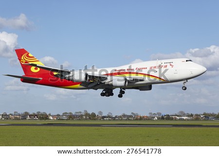 AMSTERDAM, THE NETHERLANDS - MAY, 7. A Boeing 747-481F of Yangtze River Express lands at Amsterdam Airport Schiphol (The Netherlands, AMS) on May 7, 2015. The name of the runway is Polderbaan.