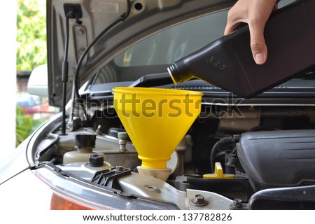 Vehicle maintenance - Filling the windshield  on Car