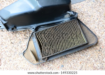 air filter to hold down some of the dust and moisture entering the engine.