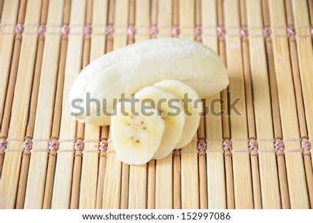 Banana slices isolated on bamboo