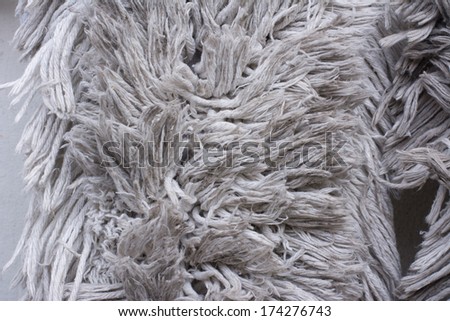 Old cloth mop. Through the use of the lot.