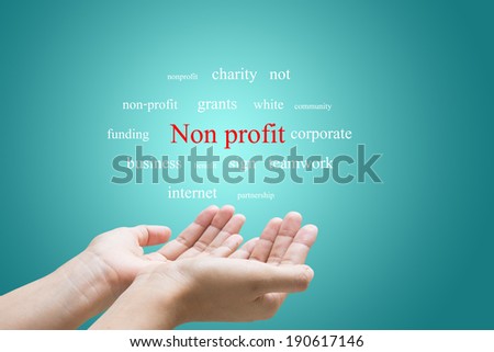 Businessman Hand Showing Non profit Word