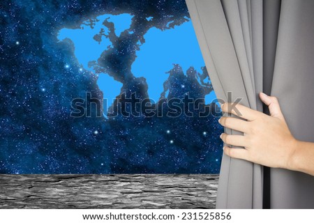 Looking through the window in a spaceship Moon and using a laptop with Earth in the background 