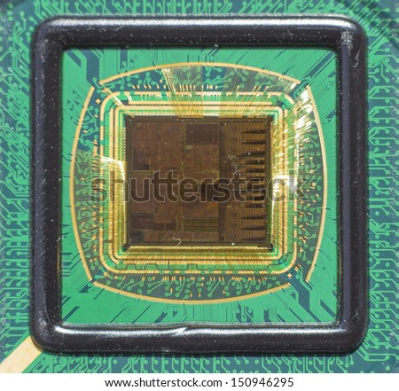 Open computer chip with gold wire connections