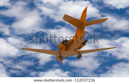 An orange airplane prepare for take off on the ground isolated against the sky