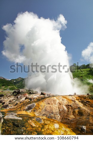 beginning of the eruption of a geyser \