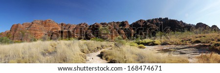 Panoramic Australian landscape with geological feature of rolling hills. The Dragon hill. Bungle Bungle national park, Western Australia.