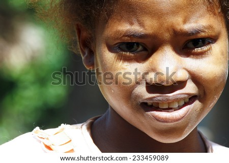 Cute young black African girl - poor child, madagascar
