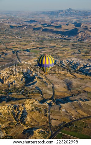 GOREME, TURKEY - JUNE 15: Hot air balloon fly over Cappadocia on June 15, 2014 in Goreme, Cappadocia, Turkey
