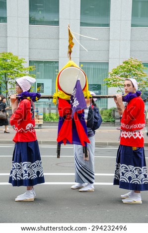SAPPORO, JAPAN - JUNE 16, 2015 : The parade of Hokkaido Shrine Festival on June 16, 2015. Hokkaido Shrine Festival is the annual festival for summer greeting in Sapporo, Japan.