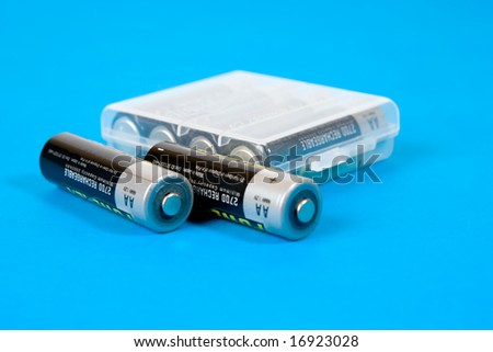 Rechargeable batteries on blue background