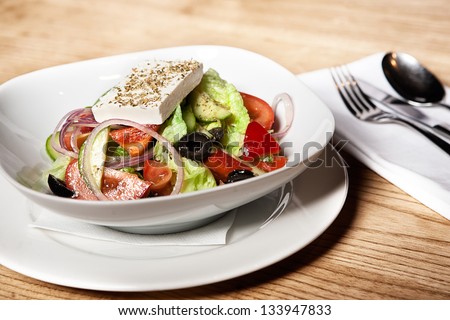 Salad Greece with cutlery
