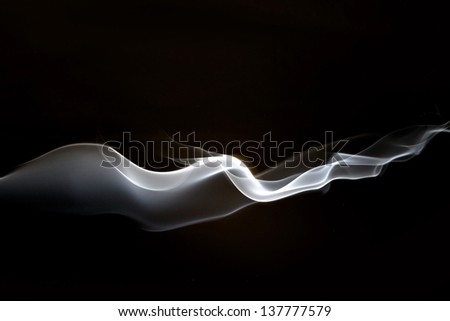 Smoke flows through the room