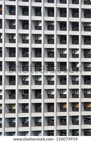 Lattice shaped windows of a modern office block in Hong Kong, China