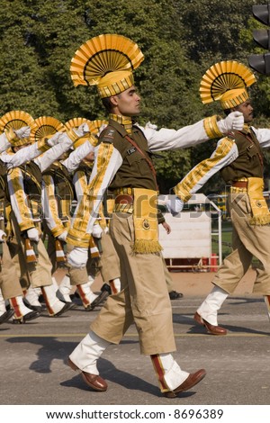 Soldier in bright yellow trimmed uniform parading down the Raj Path in preparation for the Republic Day Parade, New Delhi, India