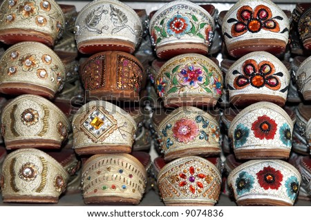 stock photo Rack of traditional Indian shoes made of camel skin and 