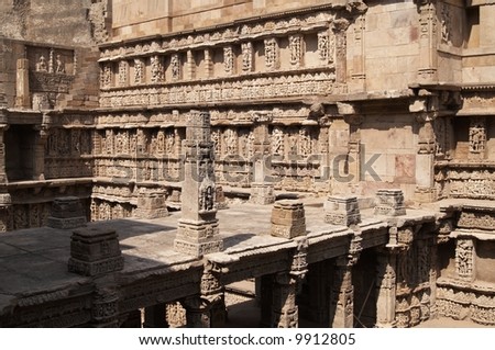 Ornate stone carved walls lining the 11th century Rani-ki-Vav step well at Patan, Gujarat, India. Became a UNESCO world Heritage Site in 2014.