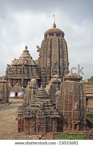 Lingaraja Hindu Temple complex. Ornately carved buildings inside a walled compound. Bhubaneswar, Orissa, India. 11th Century AD