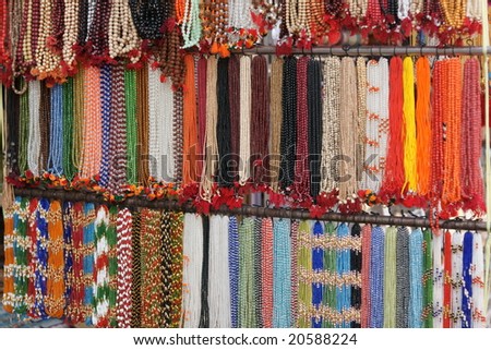 Necklaces for sale on a market stall in the sacred Indian town of Pushkar in Rajasthan