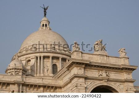 Victoria Memorial in Kolkata, India. Ornate white marble building, originally constructed as a monument to Queen Victoria of Great Britain, now a museum.