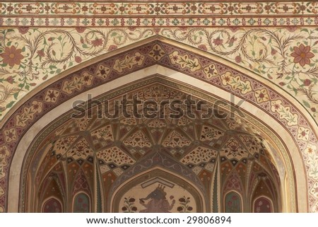 Detail of ornately decorated gateway (Ganesh Pol) inside Amber Palace, Jaipur, Rajasthan, India
